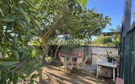 Bilocale con giardino in vendita